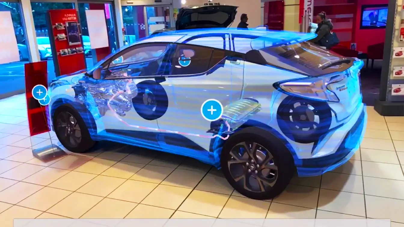 A blue hologram of a toyota SUV displayed in augmented reality within the Toyota augmented reality app