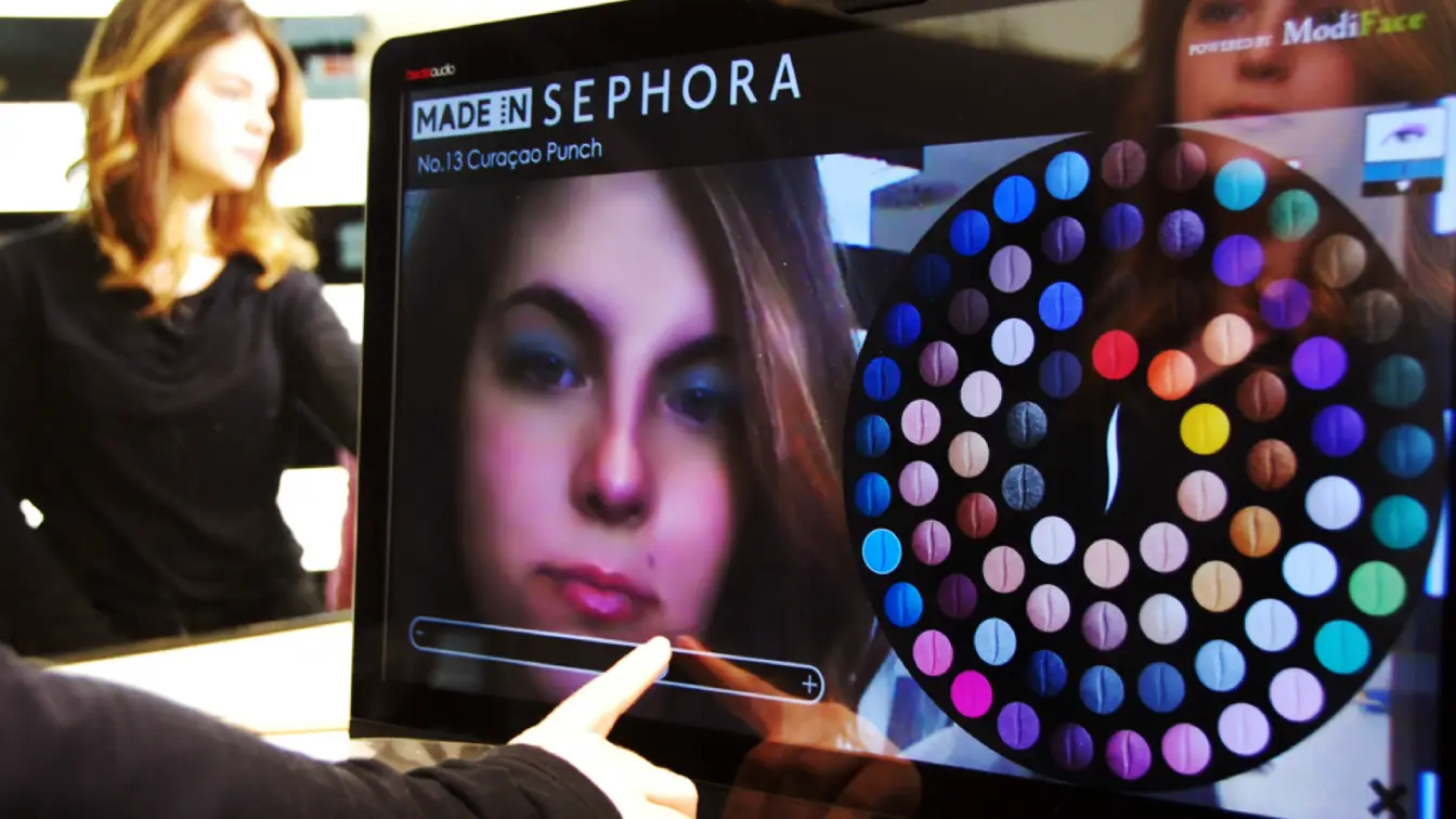 A touch screen panel in a makeup shop showcasing the Sephora Augmented Reality makeup assistant app