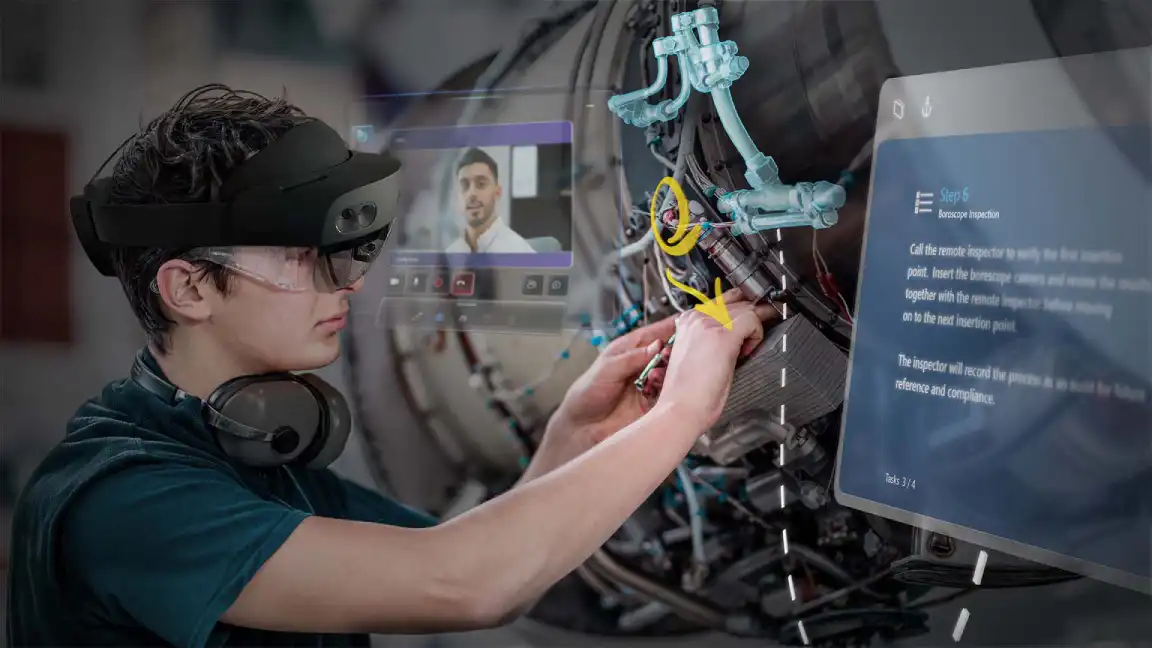 Male mechanic wearing a hololens 2 fixing a motor bike with the help of augmented reality